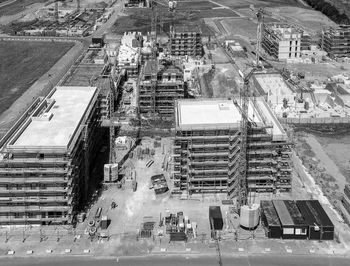 High angle view of street amidst buildings in city