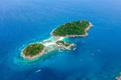 High angle view of bay against clear blue sky