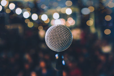 Close-up of microphone at night