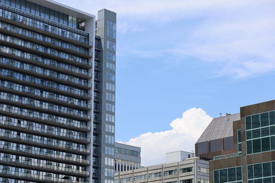 Low angle view of skyscrapers against sky