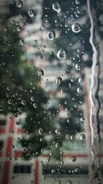 Close-up of water drops on glass