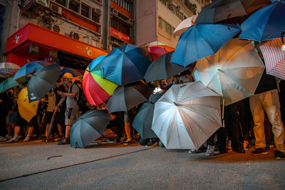 People on street in rain