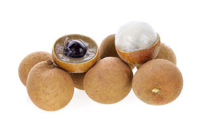 High angle view of fruits against white background