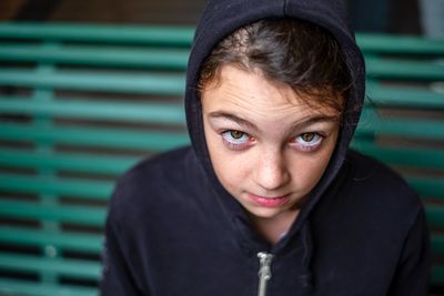 Portrait of girl wearing hooded jacket