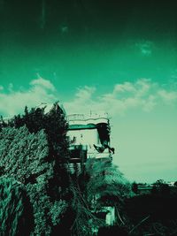 Low angle view of abandoned building against sky