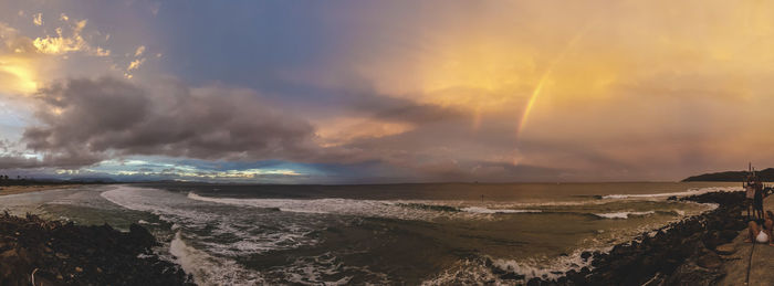 Panoramic view of sea against sky during sunset