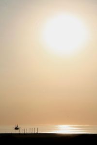 Scenic view of beach against sky during sunset