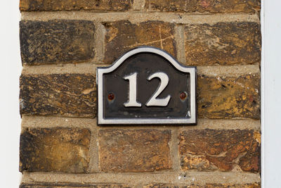 Close-up of number on wall