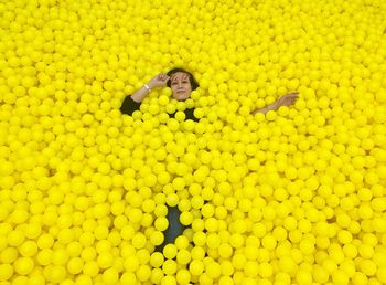 High angle view of man on yellow wall