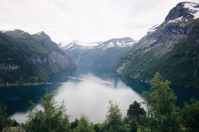 Scenic view of river and mountains