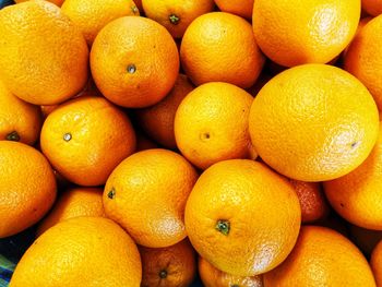 Full frame shot of oranges in market