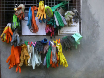 Various toys hanging on clothesline