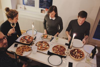 People having food at table