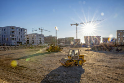 Germany, bavaria, munich, large construction site with cranes