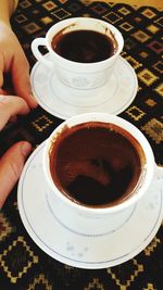 Close-up of coffee cup on table