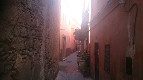 Narrow alley along buildings