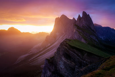 Scenic view of mountains against sky during sunrise