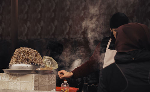 Man selling food at market