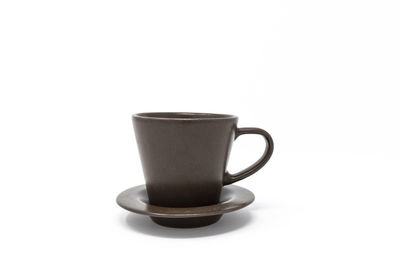 Close-up of coffee cup against white background