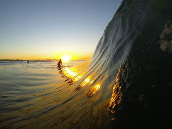 Scenic view of sea at sunset