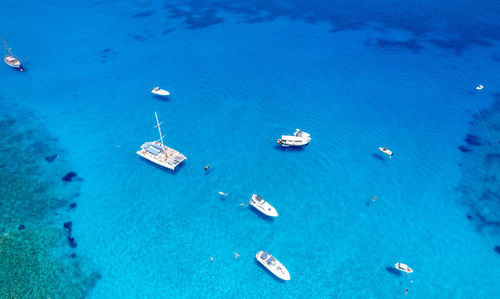 Drone aerial seascape luxury yachts moored in the coast.  summer vacations in the sea.