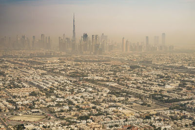 High angle view of cityscape against sky during sunset