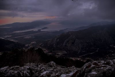 Scenic view of mountains against sky at sunset