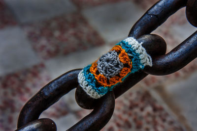 Close-up of rope tied on metal