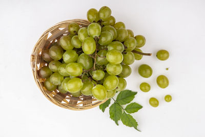 High angle view of grapes against white background