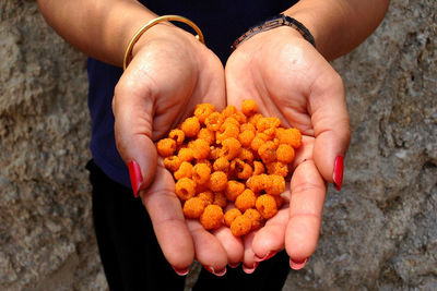 Woman hand holding fruit