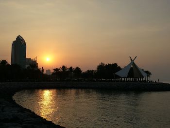 Scenic view of sunset over water