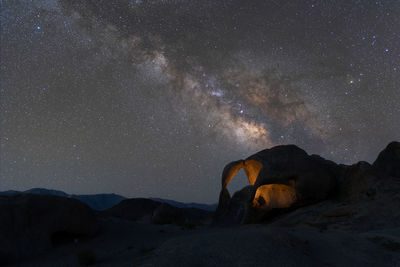 Milky way galaxy over cyclops arch in alabama hills california