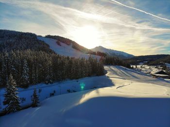 Scenic view of snowcapped mountains against sky