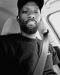 Close-up portrait of mid adult man