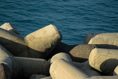 Close-up of rocks by sea