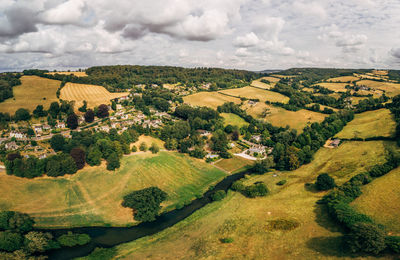 Scenic view of agricultural landscape against sky