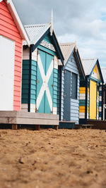 Beach huts against sky brighton beach huts 