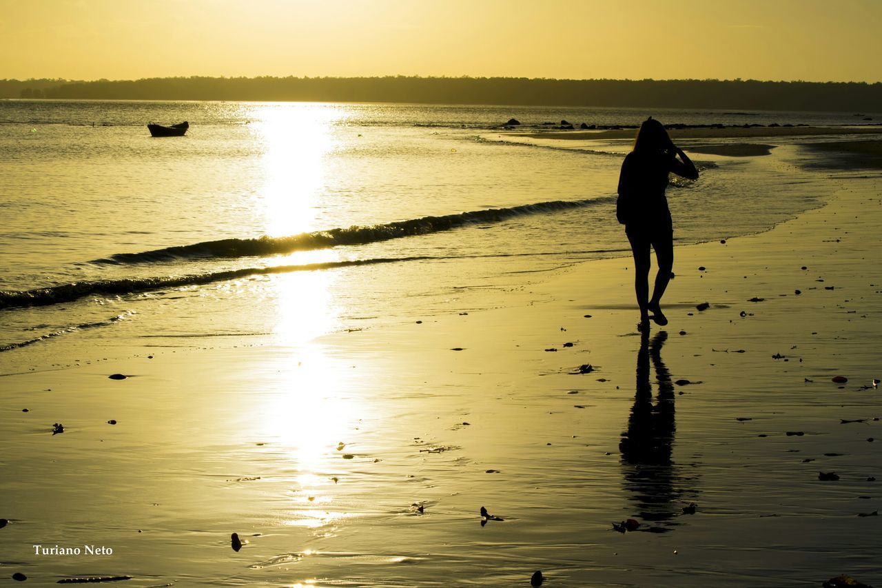 water, sunset, silhouette, reflection, sea, sun, beach, shore, beauty in nature, scenics, bird, tranquility, tranquil scene, leisure activity, nature, sunlight, lifestyles, horizon over water