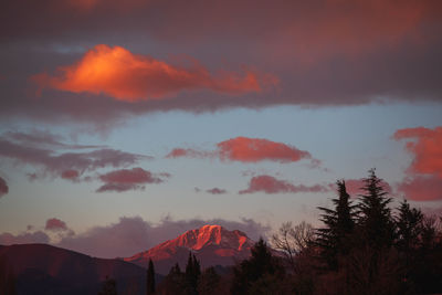 Scenic view of mountains against sky during sunset