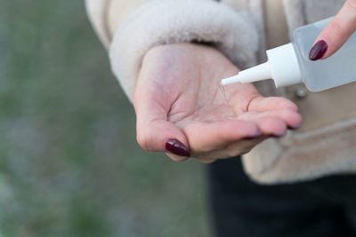 Close-up of woman holding hands