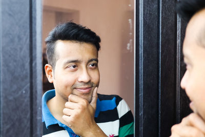 Portrait of smiling young man