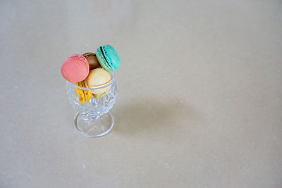 Close-up of candies on glass table