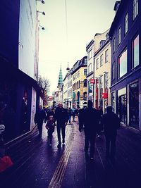 People walking on city street