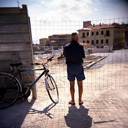 Woman standing on city street