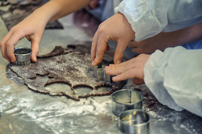Midsection of man washing hands