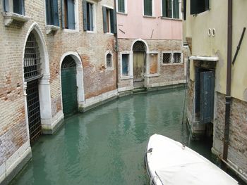 View of canal along buildings