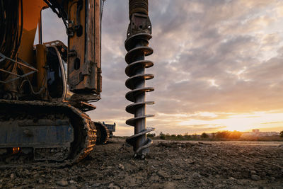 Building activity on construction site. close-up view of heavy drilling machine.