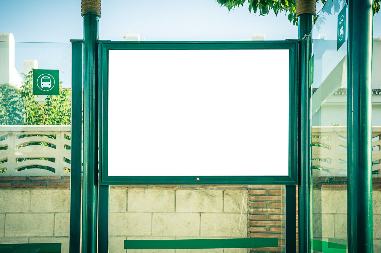 OPEN SIGN ON BUILDING WALL