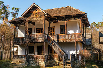 Typical romanian village with old peasant wooden houses