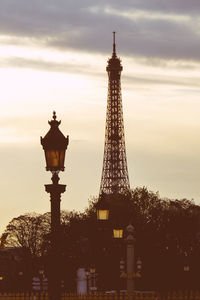 Low angle view of tower at sunset